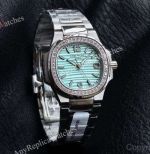 RRR Factory Patek Philippe Nautilus Cal.E 23-250SC Movement 32mm Tiffany Blue Embossed Wave Pattern Face Women Watch